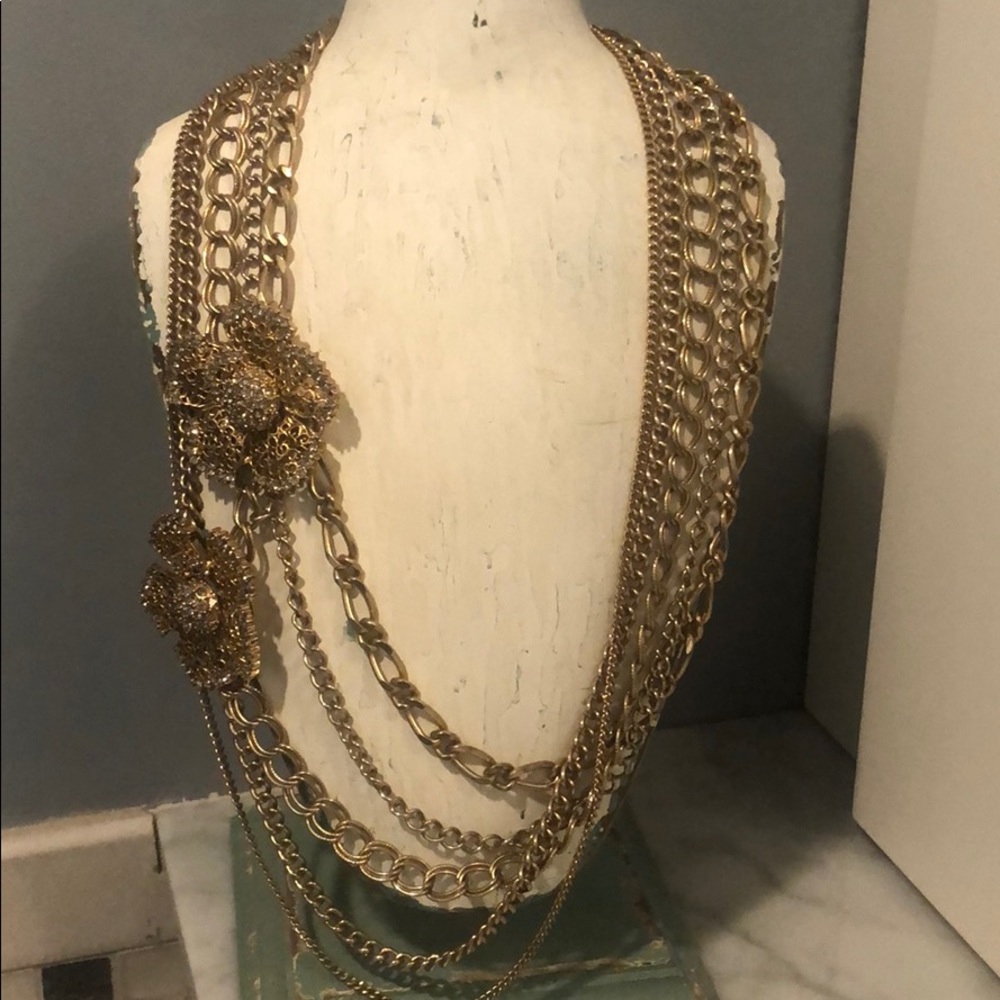 Henri Bendel necklace w/silver and gold flowers.